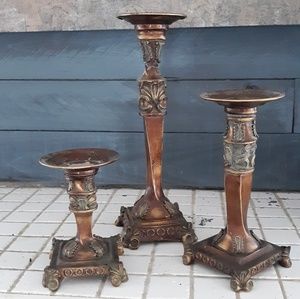 Group of Three Ornate Candlesticks